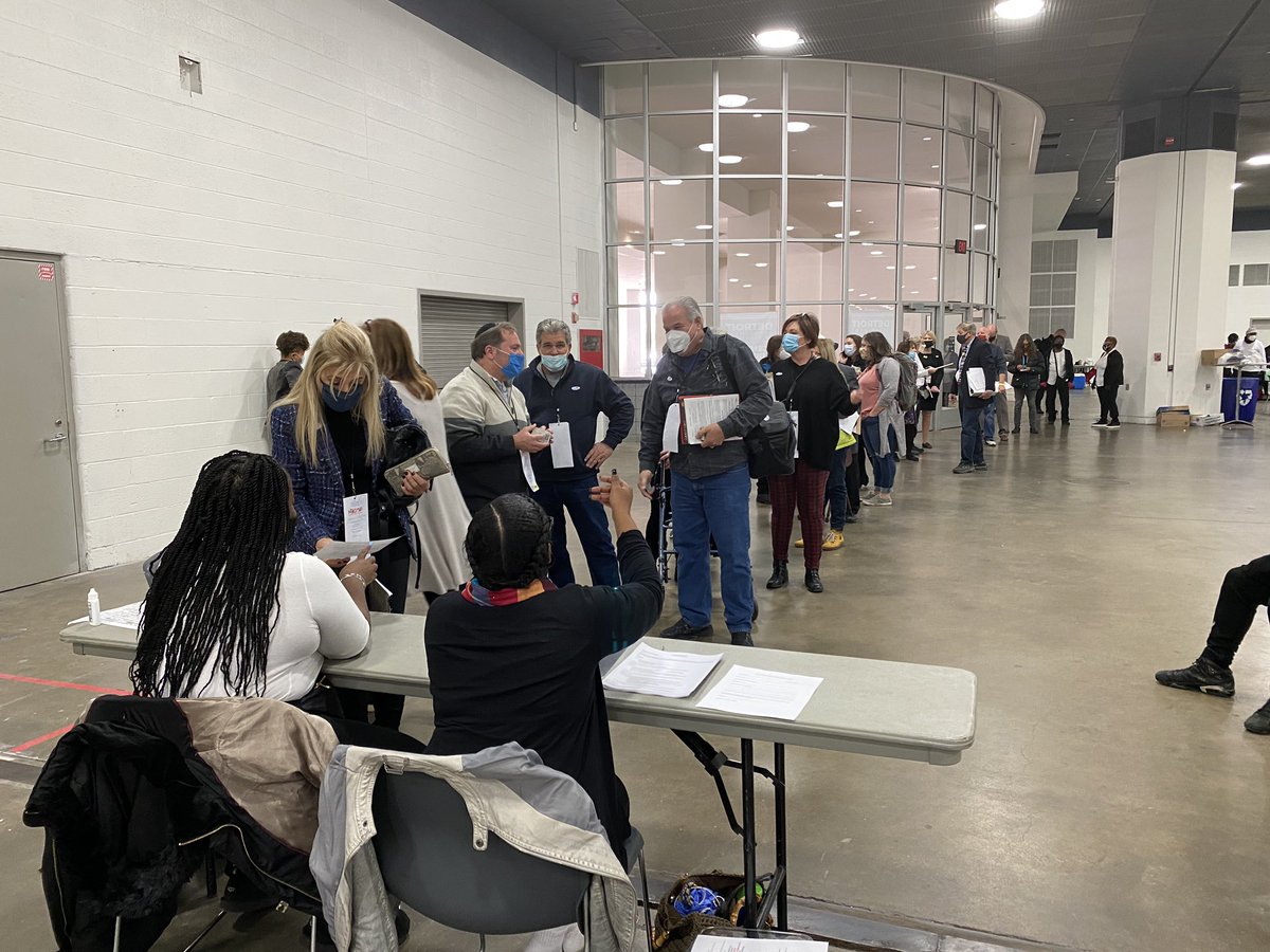 This is the line of poll challengers waiting to be checked in at TCF center. Seeing a lot of poll challengers with MI GOP credentials.