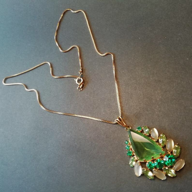 Sue makes swanky jewellery & combines her own work with selected vintage pieces. She is based in Cork & when not creating signature pieces runs an animal sanctuary. Visit her inspiring Etsy shop:  https://etsy.com/uk/shop/SwankyJewels?ref=simple-shop-header-name&listing_id=857894977y