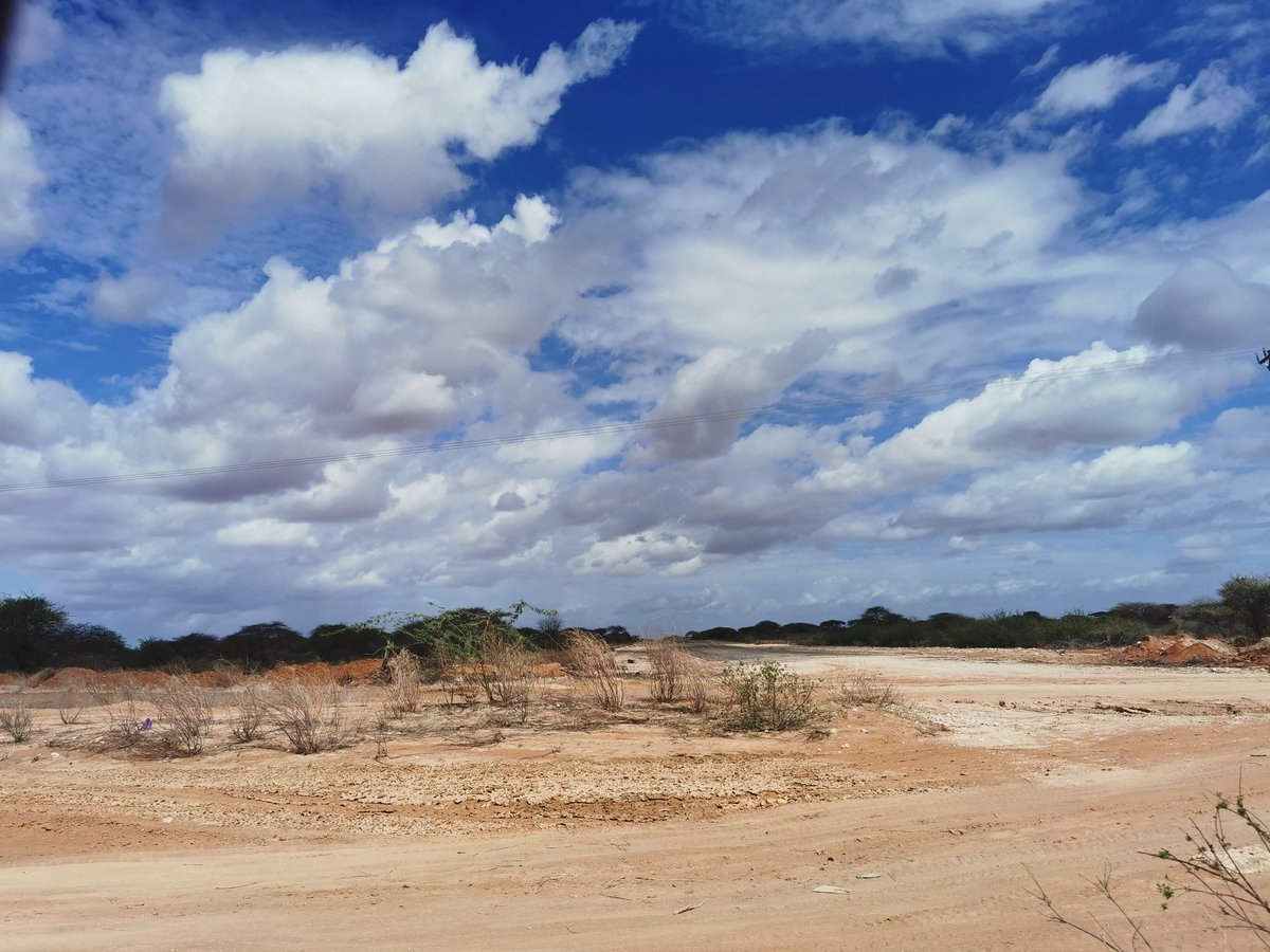 Arrived about 30 minutes ago.1st image is a tarmac road the county govt of Wajir is constructing towards the Somalia border.I got stuck, towed out by some chaps on a 4WD Toyota Hiace, rained on and clothes dried while still on the road.