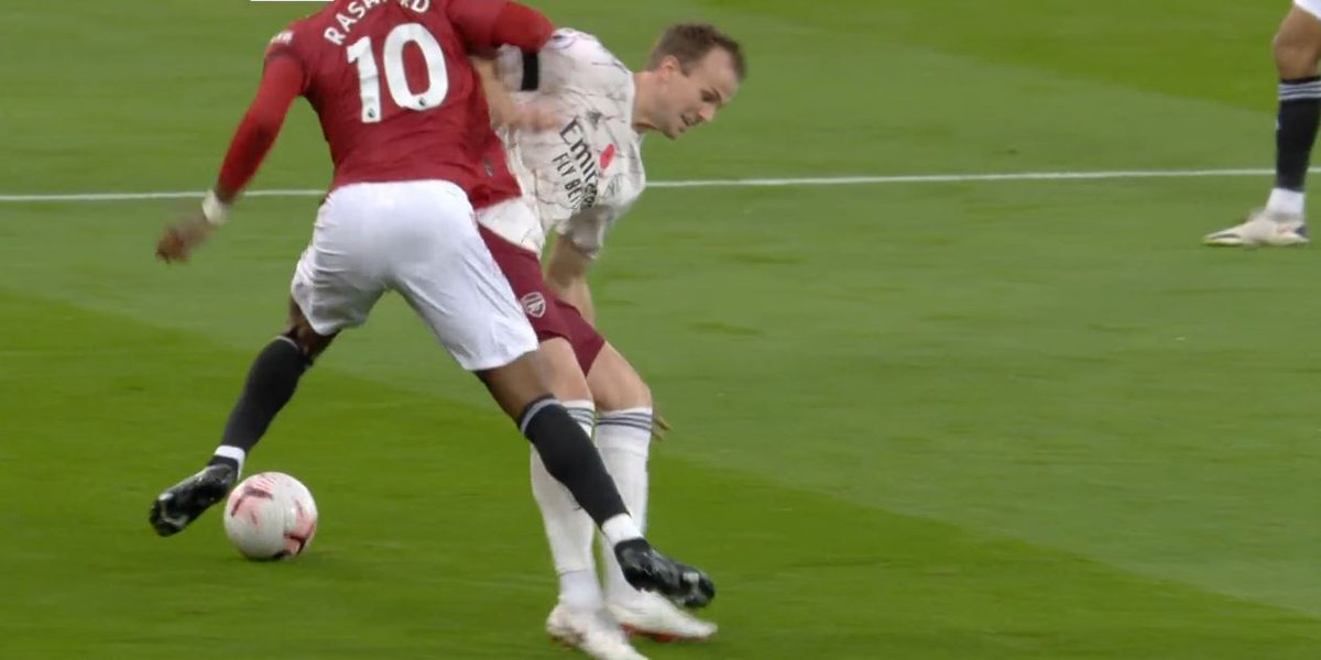 Holding – PoorThis was poor from Holding and the referee. Rashford is clearly away on a transition and Holding tactically fouls him to prevent that. He has no intention in getting the ball because the ball isn't even there anymore.Yet, there was no yellow card here.