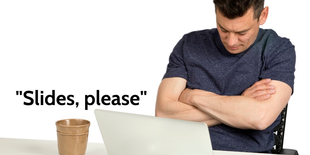 Man at a laptop, sleeping. Caption says: "Slides, please"