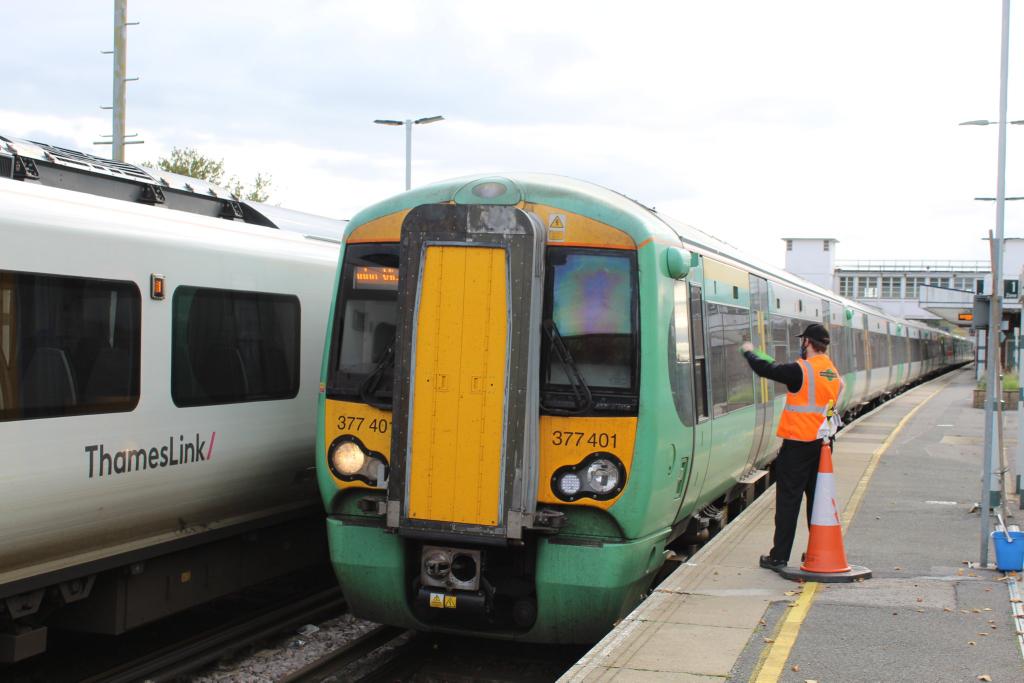 Once all these checks (collectively known as the Train Safety Check), the AD will lift their for the second time to signal "Train Safety Check Complete"The PIC then shows a green flag (green light at night) to the driver to signal, telling them it is safe to move. – bei  Horsham Railway Station (HRH)