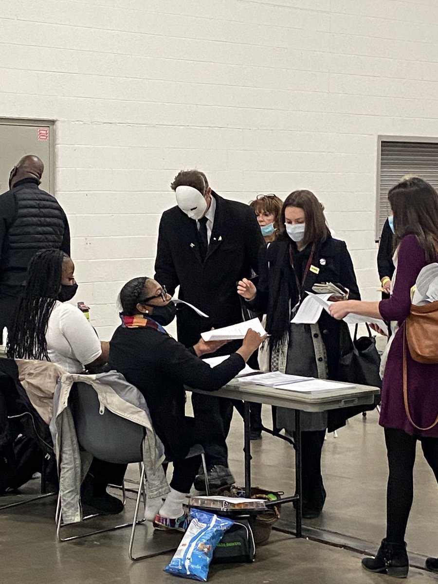 There’s a ballot challenger here at TCF Center in Detroit where ballots are to be counted wearing a mask that looks like a horror movie mask, like from the Halloween/Friday the 13th movies. Unclear who he is with. – bei  TCF Center