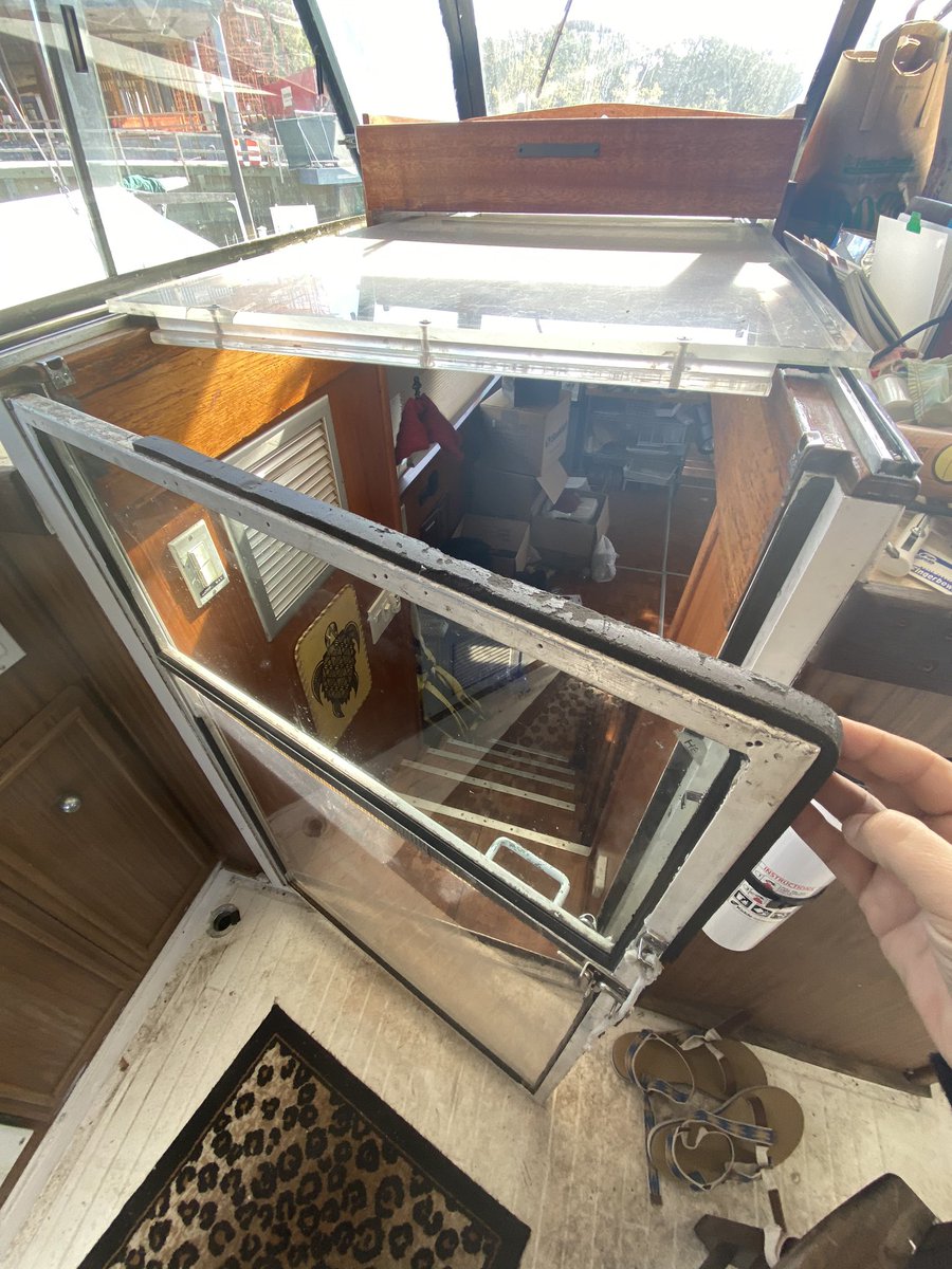 jane_bf's tweet photo. To keep it warm aboard, I have to open/close these companionway shields. Not doors, not hatches, shields. B/c then I can say “I just lowered the companionway shields for a moment to run onto the bridge and wow is it cold!” #boatlife for nerds #ihaveabridge https://t.co/HONswRXaSI