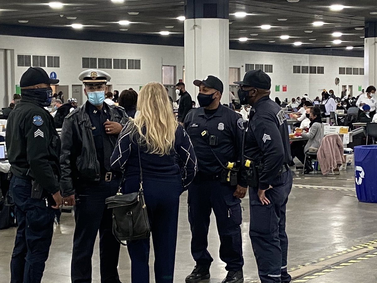 I just spoke with Detroit election official. He said the man with horror-movie mask at TCF Center shouting at poll workers was using racist language, something about slavery. (Detroit is 79% black city.) They contacted police, who are here in TCF Center, to escort him out. &ndash; bei  TCF Center