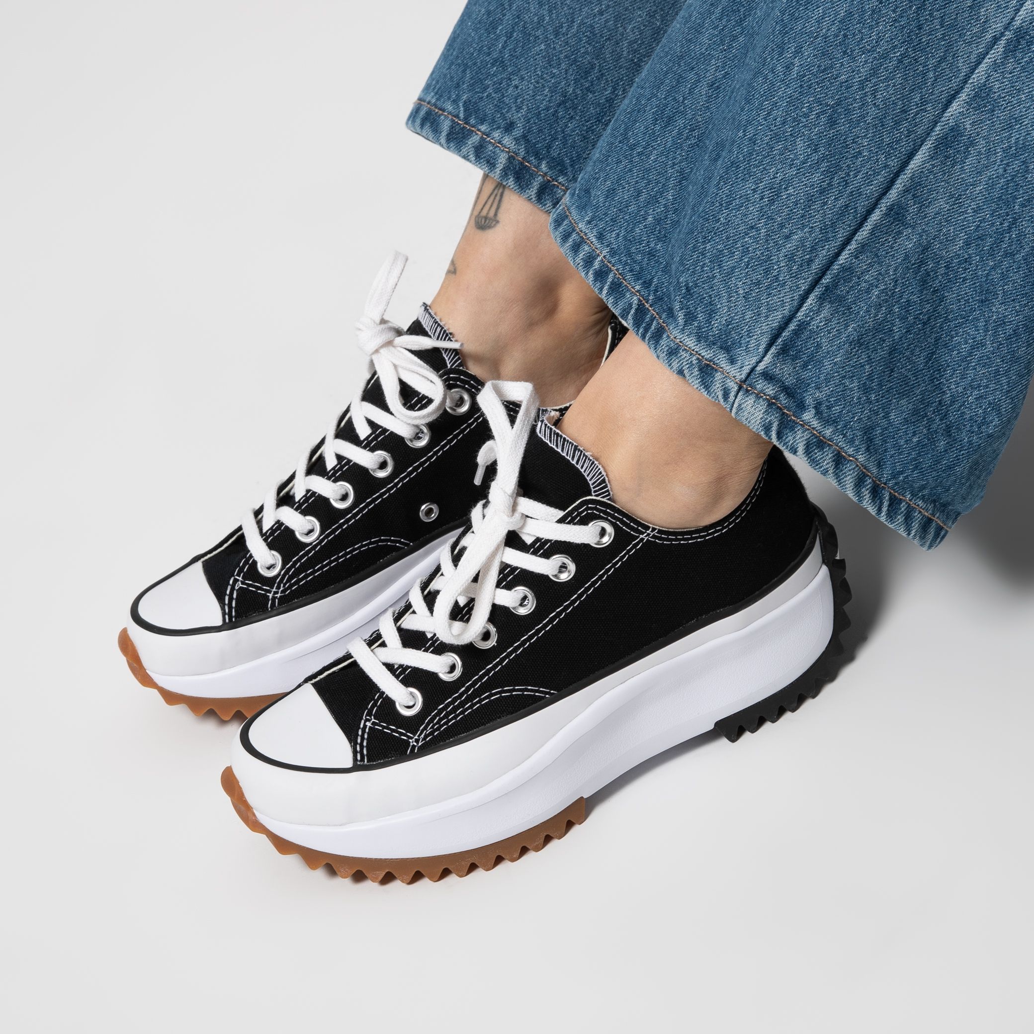 Converse x jw best sale anderson quito