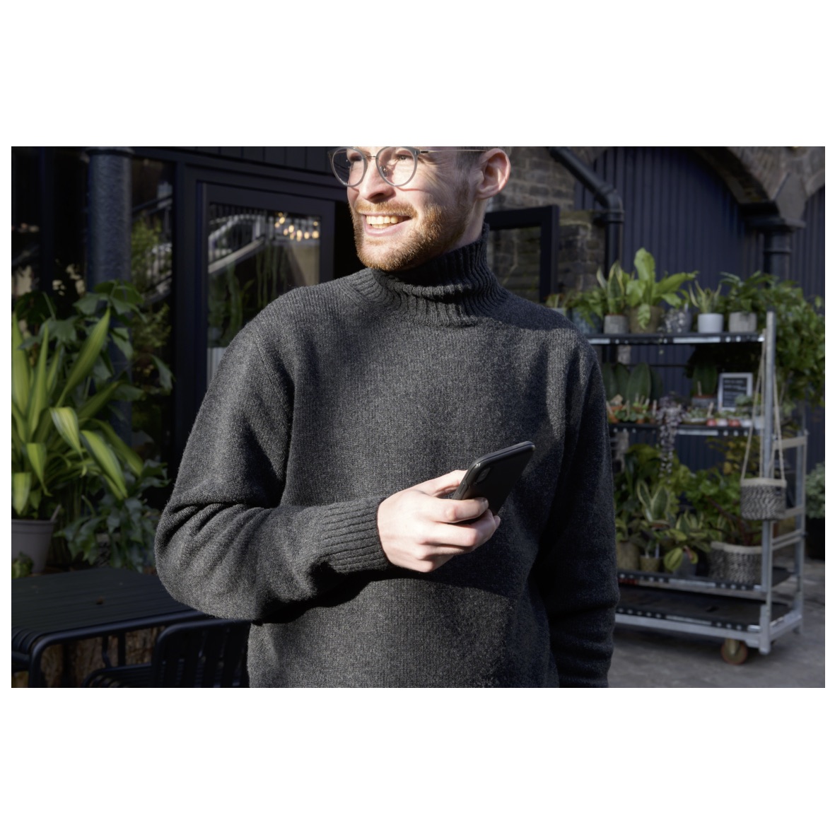 Meet Tom.

He's our main man. This is the very Tom who answers all your sweater queries. He runs everything behind the scenes here at Country. We would be nowhere without him.

Here he is looking snappy, whilst emailing, in the Staple Charcoal Funnel.