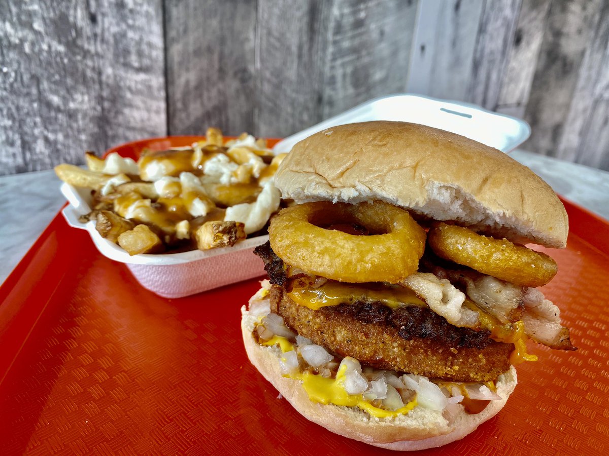 shackapatate's tweet photo. Have you tried our Shack Mansion!!!🍔 Chicken, Beef, bacon, onion rings, chipotle sauce, cheese, onions, mustard &amp; bbq sauce. You NEED to try this #burger!!! 😍 #shackapate #shpk https://t.co/jEFq6BuGeV