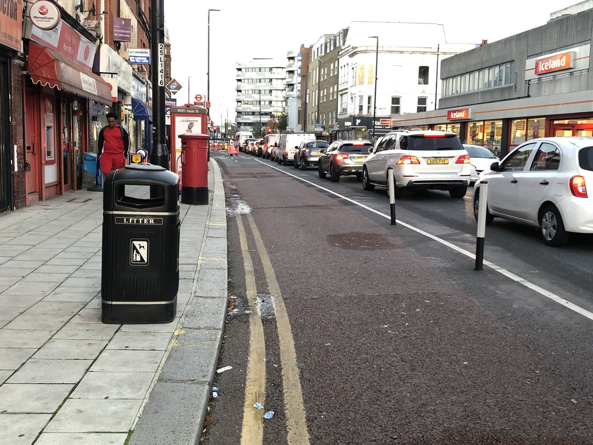 You join Trafalgar Rd at Christchurch Way where 2-way segregated cycle lane begins. Arrangements across the junction are a bit messy so take care. Wands provide protection until you approach Tyler St bus stop which is being removed. Until then buses pull into the cycle lane. 