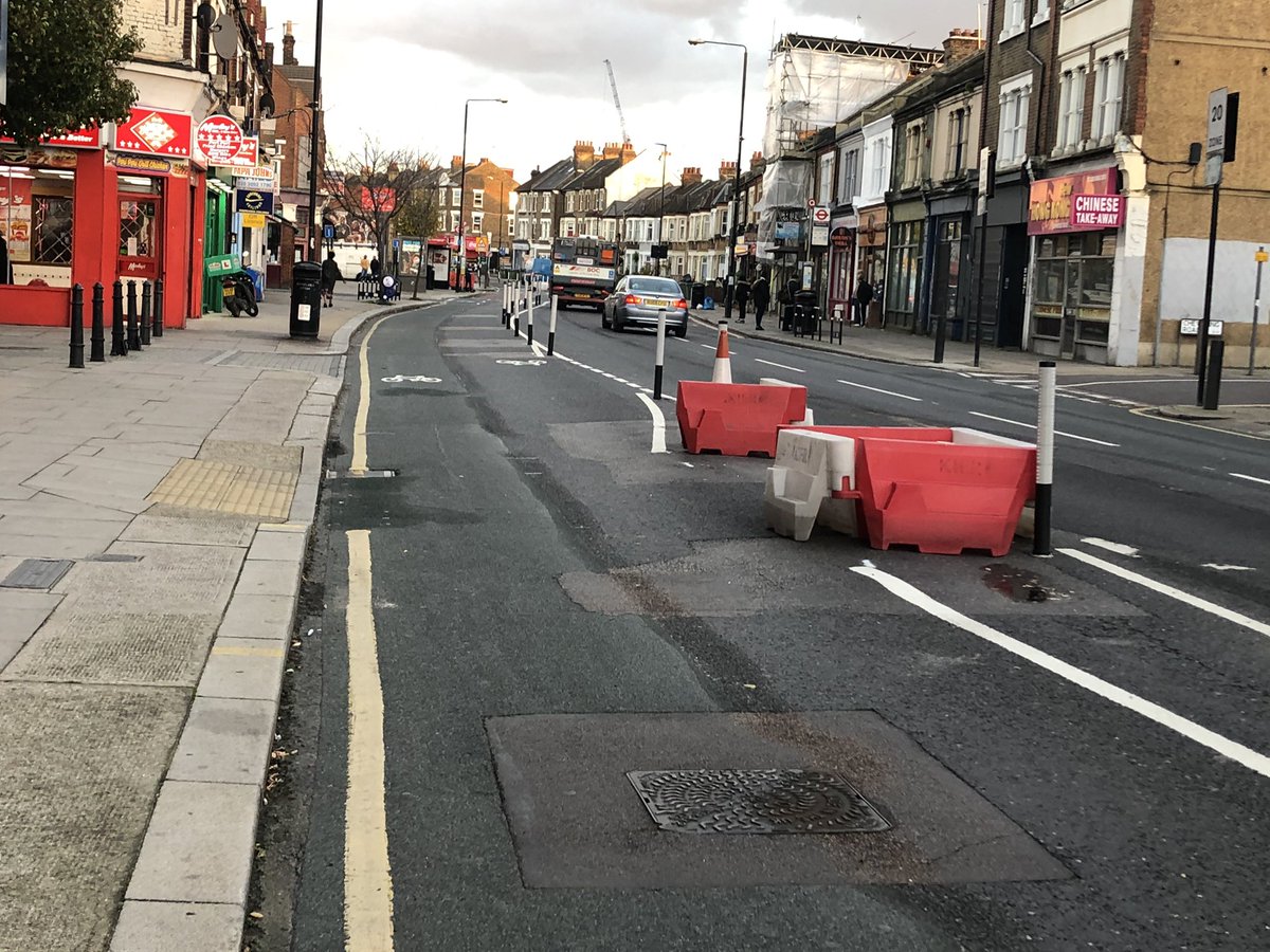 The next stretch of cycle lane along Woolwich Road works well and is almost complete. I think these are supposed to be pedestrian islands to assist with crossing the road, but have been left like this for weeks. It looks a mess.