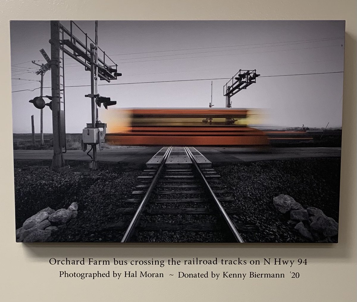 OFMSLMC's tweet image. We have a really cool photograph hanging in our middle school library that was donated by school board member Kenny Biermann. (Don't worry...the bus wasn't speeding across the tracks!  It's just a technique the photographer used!) #OFarmPride