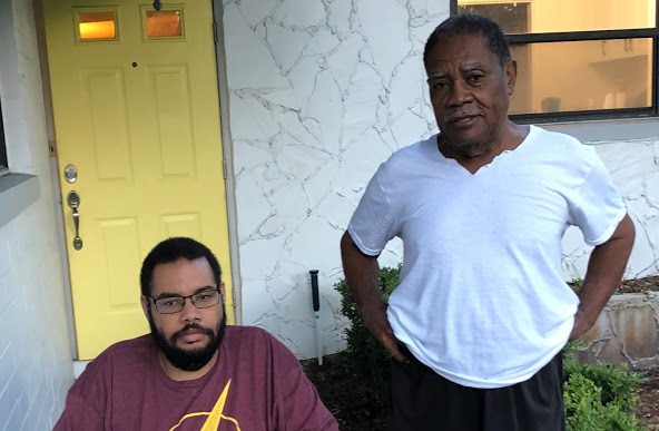 my dad, seen here with some jackass. and an older picture of him doing his thing. he looooves music.