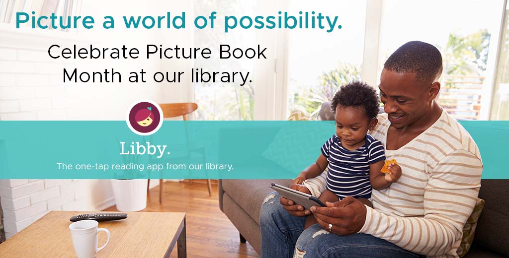 a toddler sitting in a man's lap, both of them looking down at a tablet