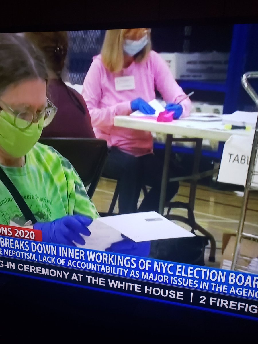 Adam11551017's tweet photo. @UnicornRescue17 @realDonaldTrump @POTUS The lady in the pink shirt is openly changing a ballet, this was on OAN the other day.... why would she even be allowed to have a pen doing this job? https://t.co/bH3LQaLmWO