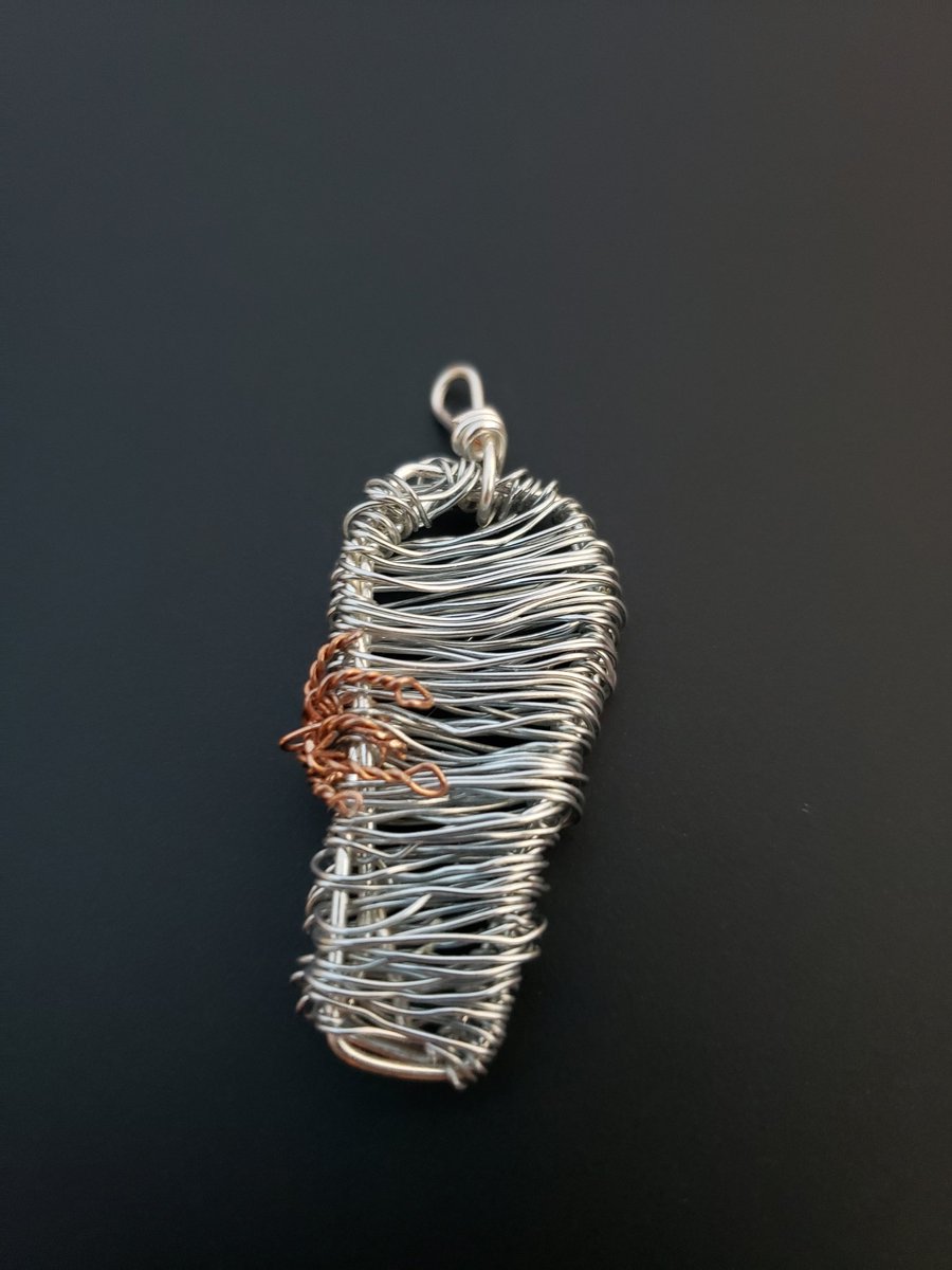 SuperpowersSara's tweet photo. Up close necklace photos: zombie hand coming out of a coffin. https://t.co/4ZExWHgAjp