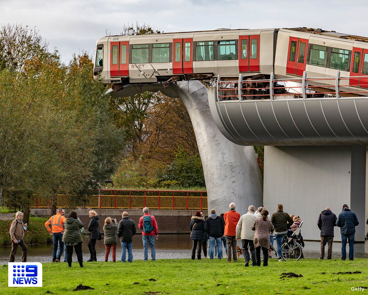 9NewsSyd's tweet photo. What a fluke – a sculpture of a whale’s tail has caught a train after it crashed through barriers in the Dutch city of Rotterdam. #9News 

Read More: https://t.co/wJabm1larV https://t.co/k3OiMh0lLy