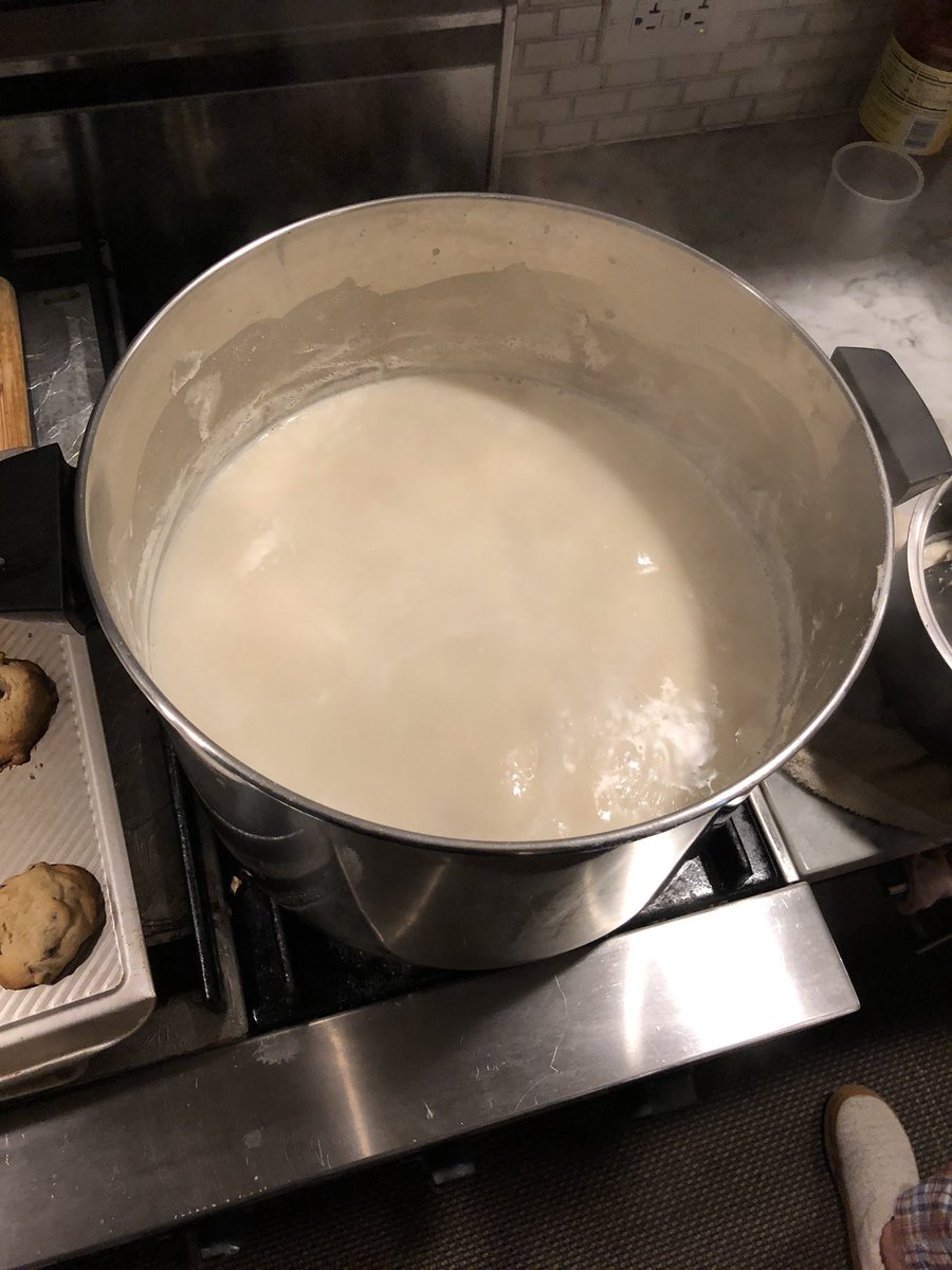 The slowly cooked soy milk looks very rich now. Beforehand mom soaked the soy beans in water overnight and blended them with some water before pouring it in the big ass pot