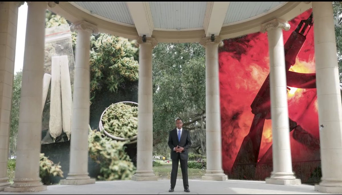 skooks's tweet photo. There is an Arthur Hunter ad on Facebook where Arthur stands in the City Park Peristyle facing the camera while enormous images of weed and a gun on fire appear behind him. https://t.co/VRg2DK4Qq3