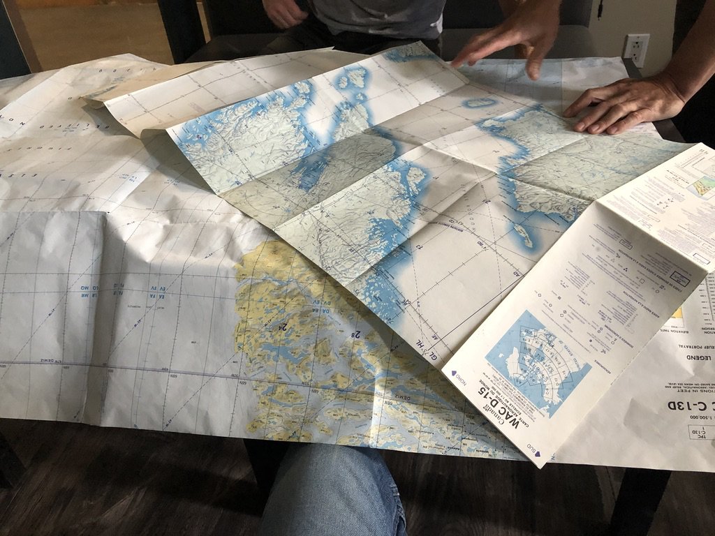 The next news is that Greenland won't let us stay overnight, and it's too late to make it to Iceland today. So we're stuck in Kuujjuaq for another day. Fine. Trip planning: we don't have electronic maps for Greenland