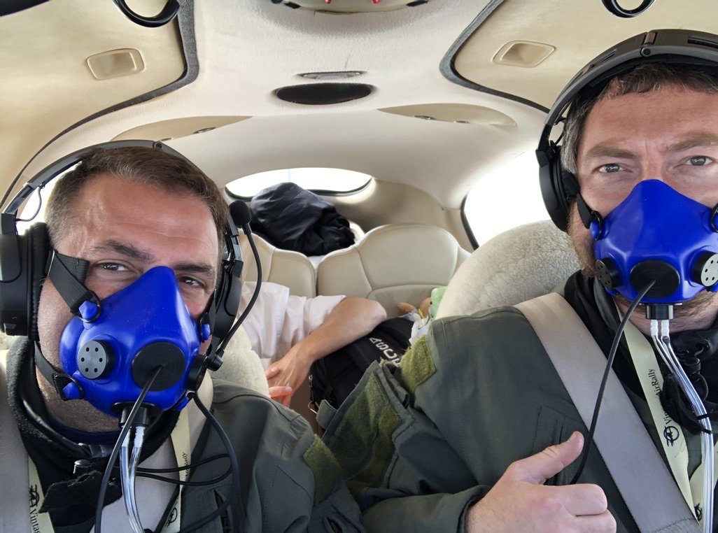 But soon we're at 12,500 ft, the air temperature is -7C, and we're still in clouds: now icing is a risk, and we have to climb above the clouds. At 15,500 feet we're out. Oxygen time!