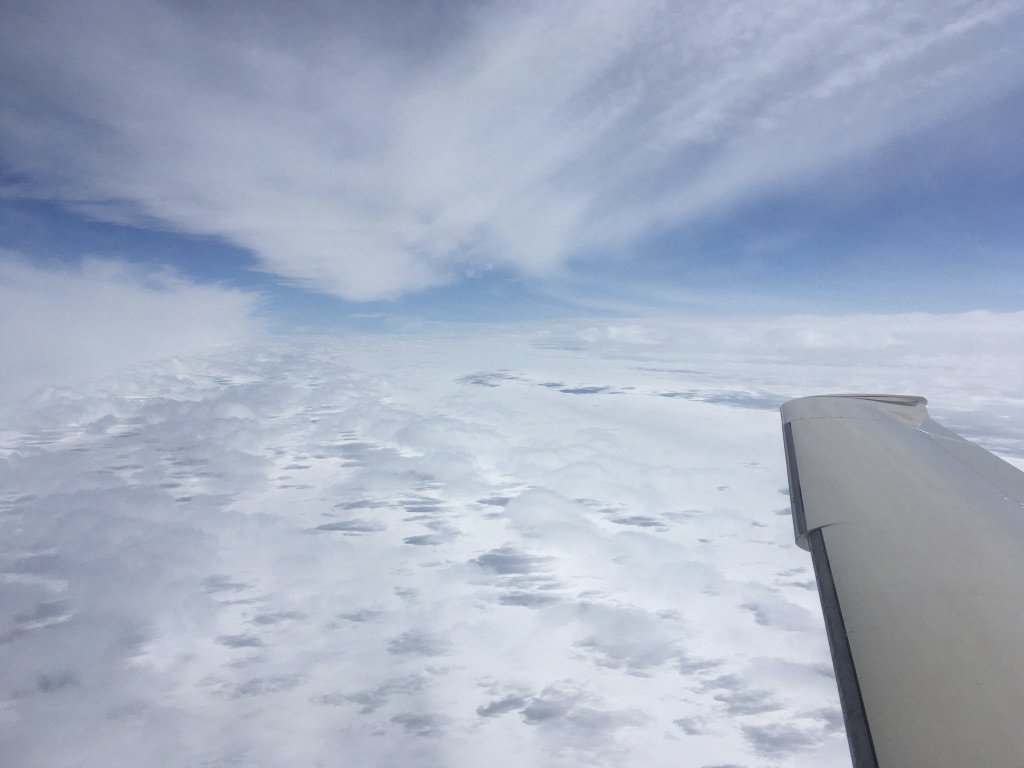 But soon we're at 12,500 ft, the air temperature is -7C, and we're still in clouds: now icing is a risk, and we have to climb above the clouds. At 15,500 feet we're out. Oxygen time!