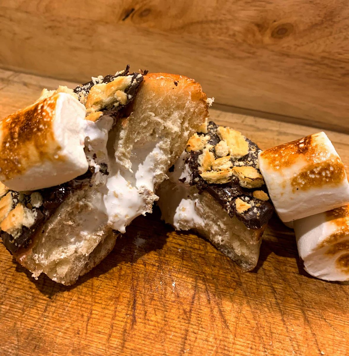 New flavour alert! 🎆 🤤

This flavour is inspired by a favourite bonfire treat... S'mores! 🔥

Marshmallow fluff filling, topped with a chocolate glaze, chopped cracker, toasted marshmallow and a popping candy surprise.

Available on the website now and throughout November 🍩