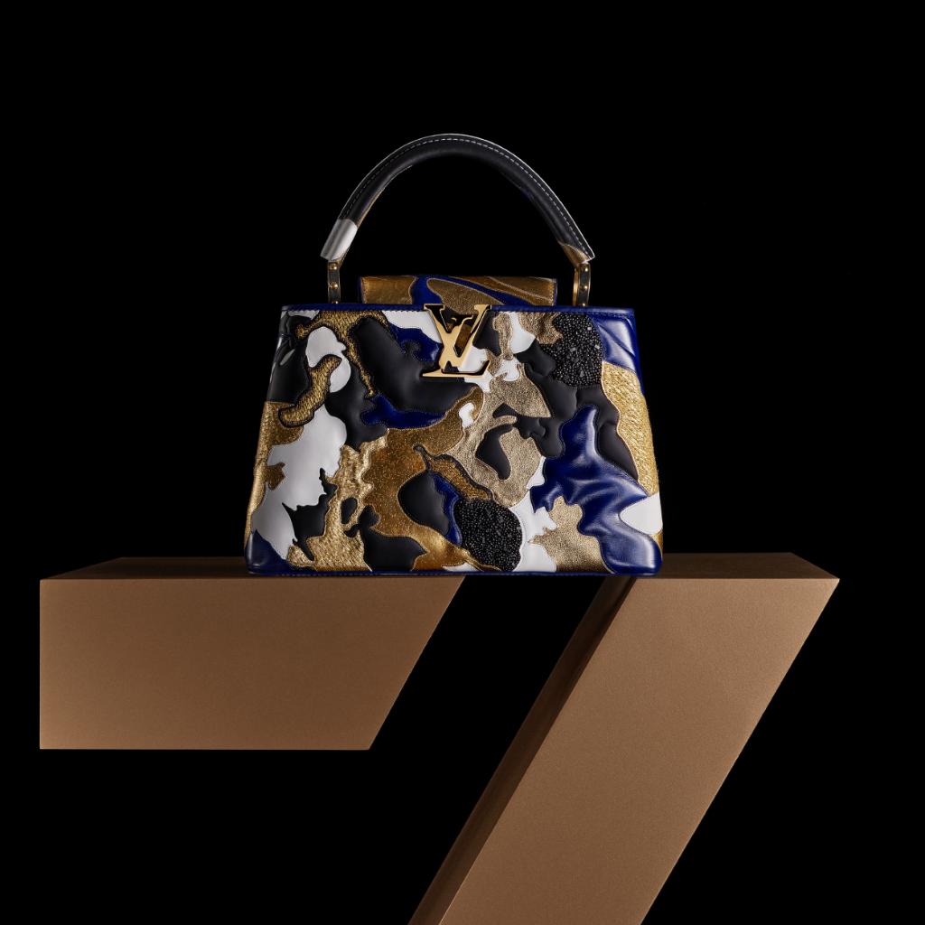 LouisVuitton's tweet photo. Meticulous assembly. #ZhaoZhao’s #ArtyCapucines recreates one of his compressed metal works as a multi-textured and multi-colored leather patchwork. Discover #LouisVuitton’s limited-edition artistic collaboration at https://t.co/y10luGRRaf https://t.co/cvkdW3kVbC