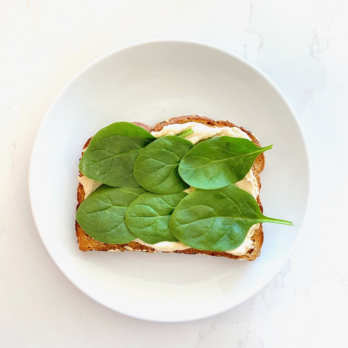 TodaysVegan's tweet image. 1 of 2: Fast &amp;amp; Easy Vegan Breakfast

What could be easier if you’re just beginning to try a vegan diet?

1, 2, 3…
Whole wheat toast
Hummus
Spinach

I like these brands:
@KillerBread 21 Whole Grains and Seeds Bread
@CedarsFoods Organic Original Know Better Hommus
