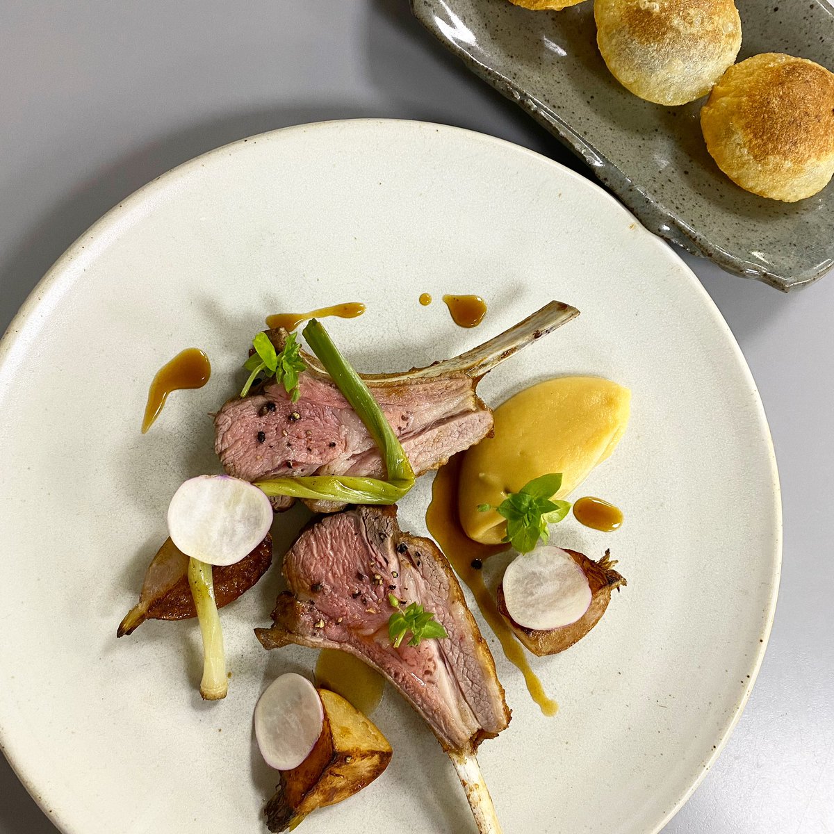 TomKitchin's tweet photo. We’re back open @thekitchin today with 6pm closure and no alcohol. Due to cancellations we now have availability. Delicious seasonal dishes on the menu like this new lamb dish, with local neeps and haggis pomme soufflé.. If you would like come, pls check availability online. Thx https://t.co/2cLn7DdPqZ