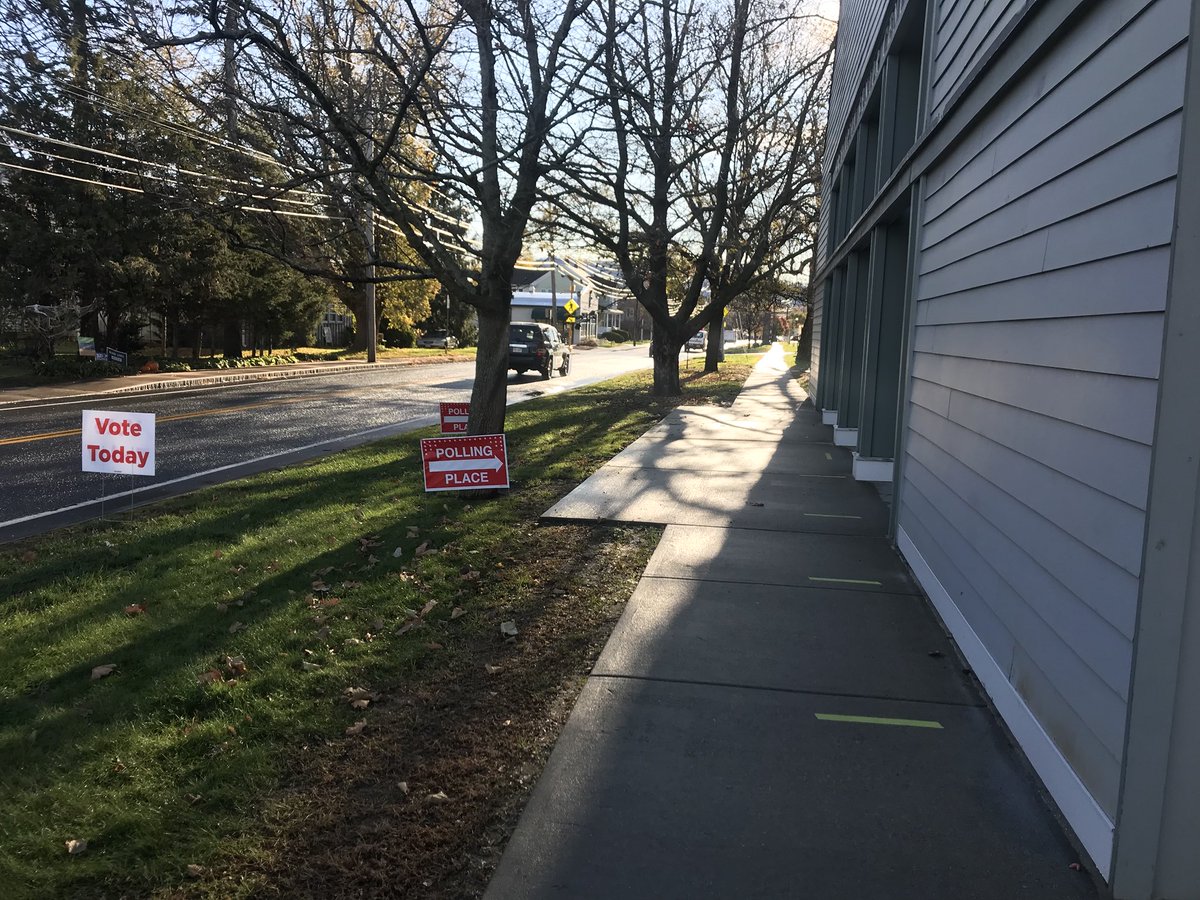 the outside of the Northampton senior center with several signs in the lawn telling voters it’s a polling location