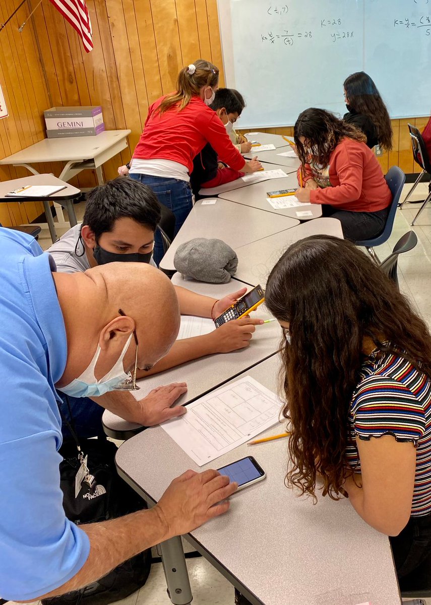 AJBriesemeister's tweet photo. @AJBriesemeister Teachers, Mr. Leo Molina & Mrs. Genie Rangel, give feedback to 8th grade students on how they are graphing and ✍️ writing equations for proportional situations using a graphing calculator AFTER working out the equations in pairs. #ShowYourWork #SlowToGoFast https://t.co/Qt5tPR7RKk
