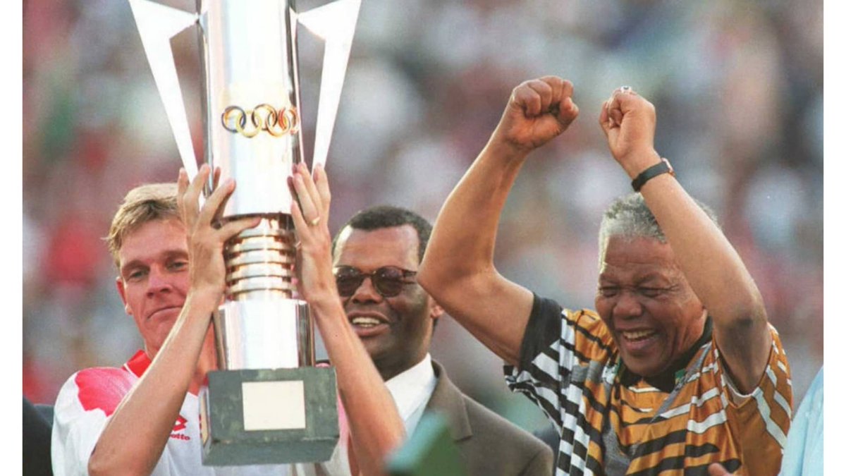 For some inexplicable reason, without having played competitive football in 2 and half years, with pretty much the same players that flopped in '93, Bafana manage to blaze through the field to lift the trophy with Mandela standing right there next to a white captain. The optics!