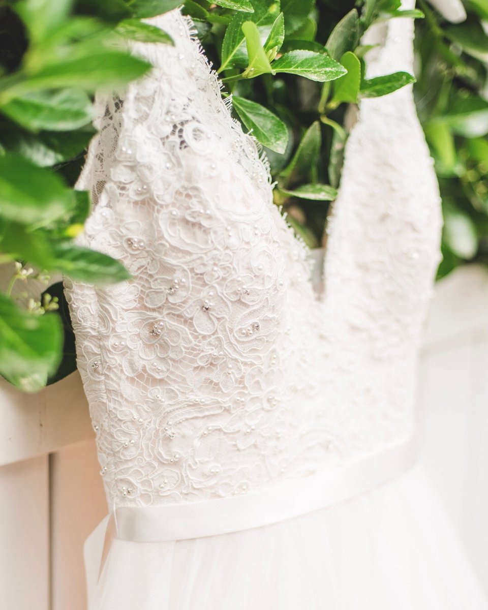 Paloma_Blanca's tweet photo. Hello beautiful! 😍 #Style4798 gets us every time! From the delicate hand beading to the soft tulle skirt, the details on this dress is what makes it so special! #palomablancabridal // 📷 Sarah and Dave Photography https://t.co/Q6PFMh0oaA