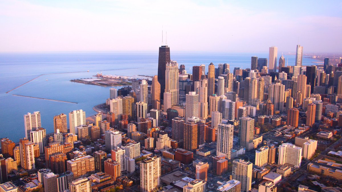 Aerial photograph of Chicago, IL skyline looking back towards Lake Michigan. 