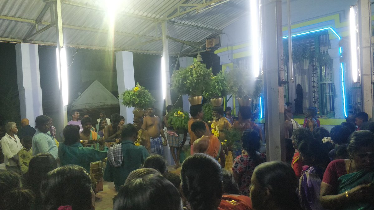 Once the archanai ends, temple saami comes around with archanai plate and the saami kondati's distribute thiruneer.