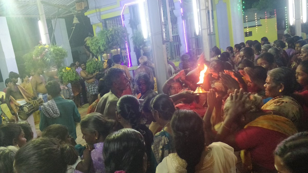 Once the archanai ends, temple saami comes around with archanai plate and the saami kondati's distribute thiruneer.