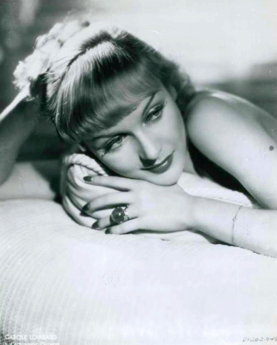 Carole Lombard in a Paramount Pictures publicity shot by Eugene Robert Richee, 1933And a portrait in pastels by Ed Dow, 1933