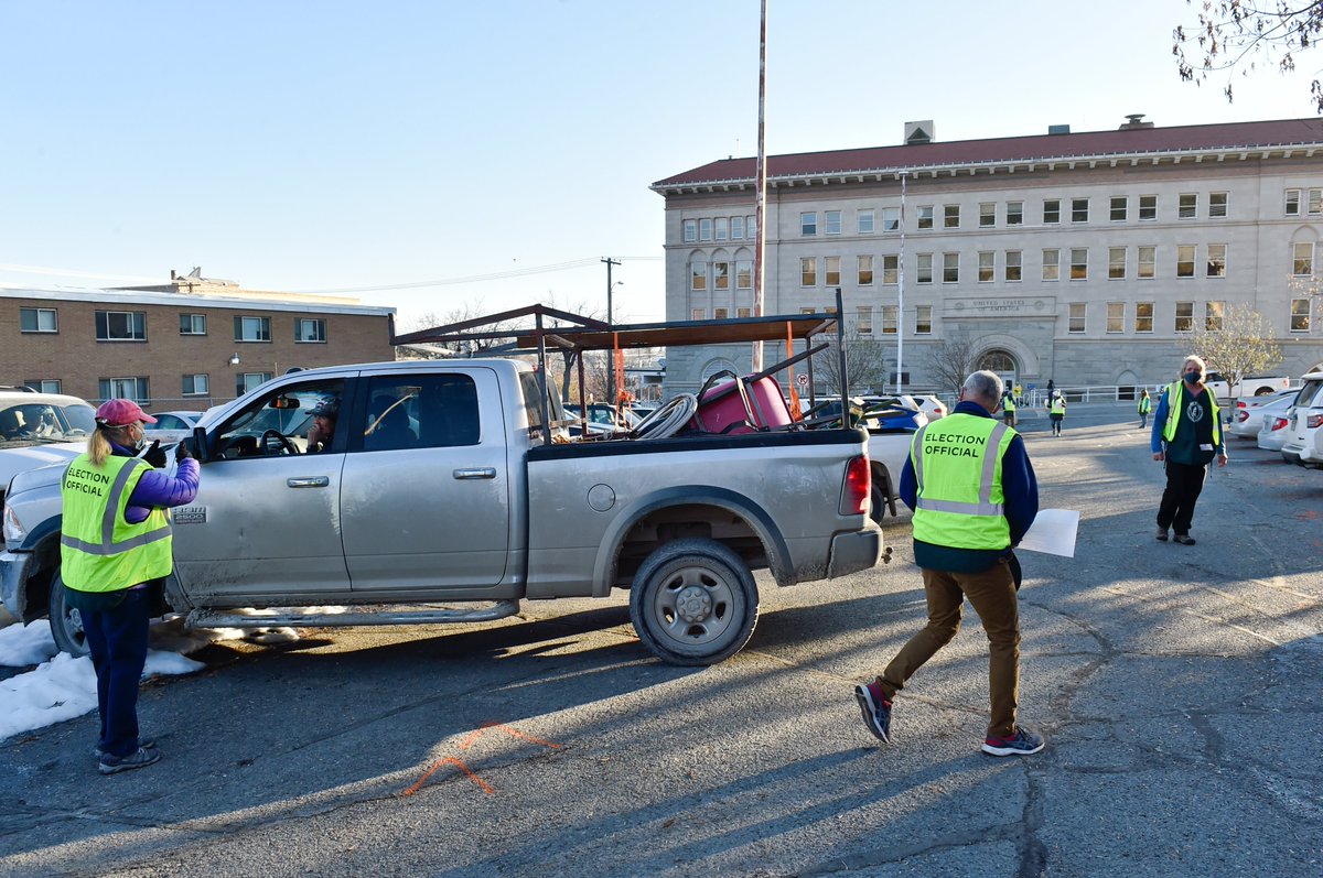 Outside is a the "vote and park" operation where voters remain in their vehicles while election volunteers act as proxies by running their ballots and voter registration into the building. #mtpol  #mtnews  #mtvotes