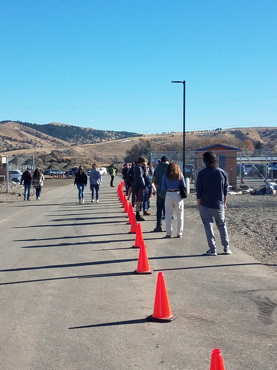 Voters waiting to cast their ballots at the Gallatin County Fairgrounds were standing in a line that wrapped through two buildings and around the parking lot toward Haynes Pavilion at 11:00 a.m. #voting #mtnews