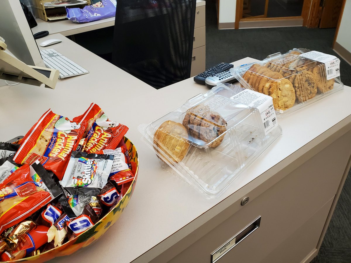 KellyHumphrey2's tweet photo. Election day snacks to keep us from getting too hungry before the @ElectionPizza gets here. I have already eaten five cookies, an unknown number of Milky Ways from the editor's left over Halloween candy and a pack of zombie Skittles. #Election2020 https://t.co/nDzMgQ9mMf