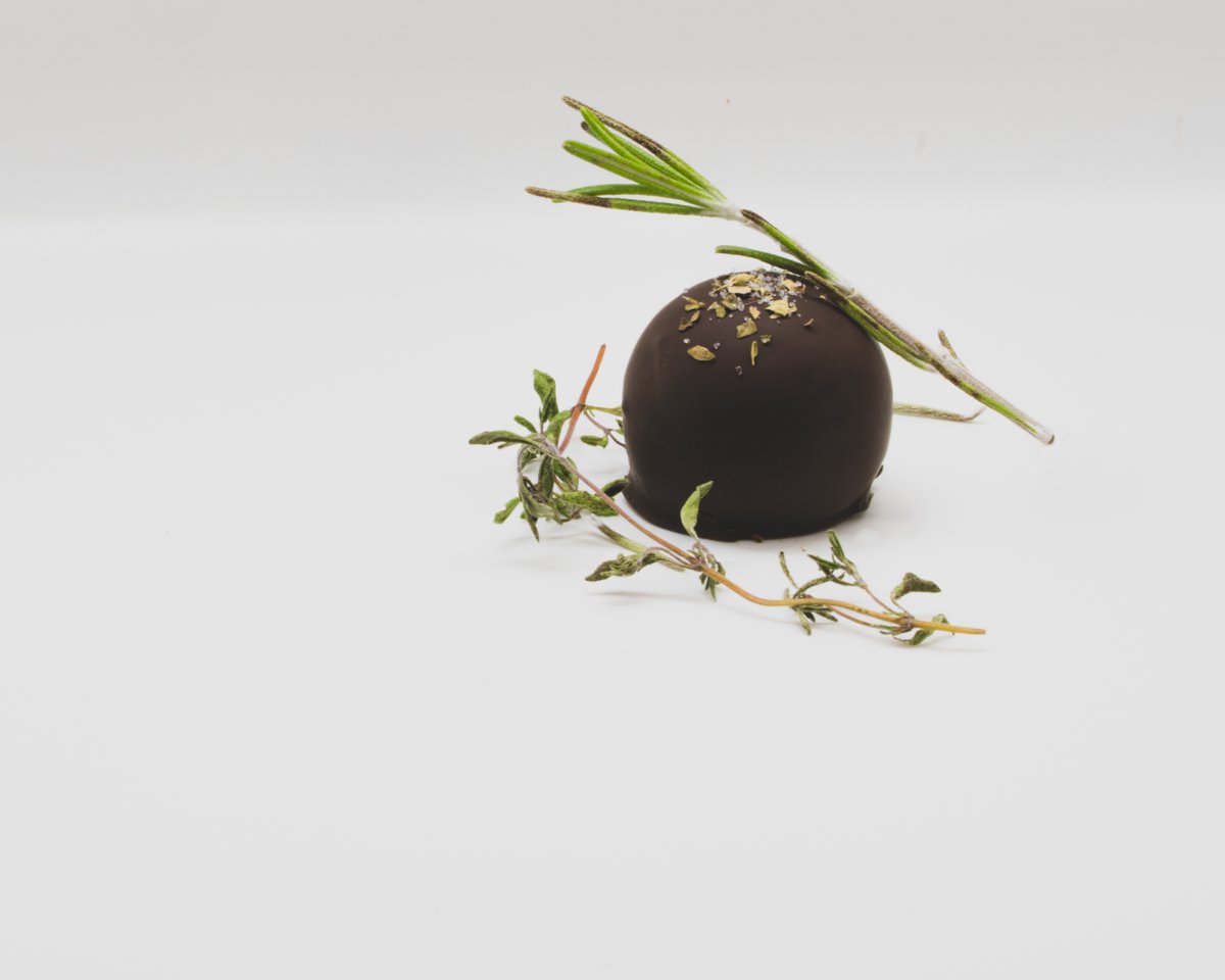 laughinggullcho's tweet photo. Our next November flavor: herb and oil! Topped with a pinch of salted dried thyme, this savory truffle will "knock your socks off"- according to Allison B Zukoski #iloveny #localflavors #tasterochester #organic #directtradechocolate #savorychocolate #electionday #seasonal https://t.co/5VycDev4kx
