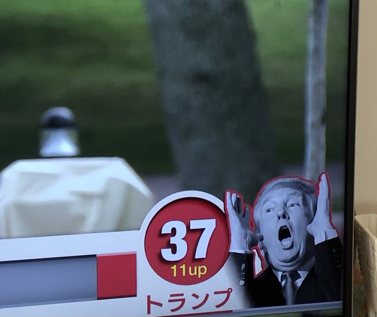 Asahi TV reporting new electoral votes for Trump with graphic accompaniment