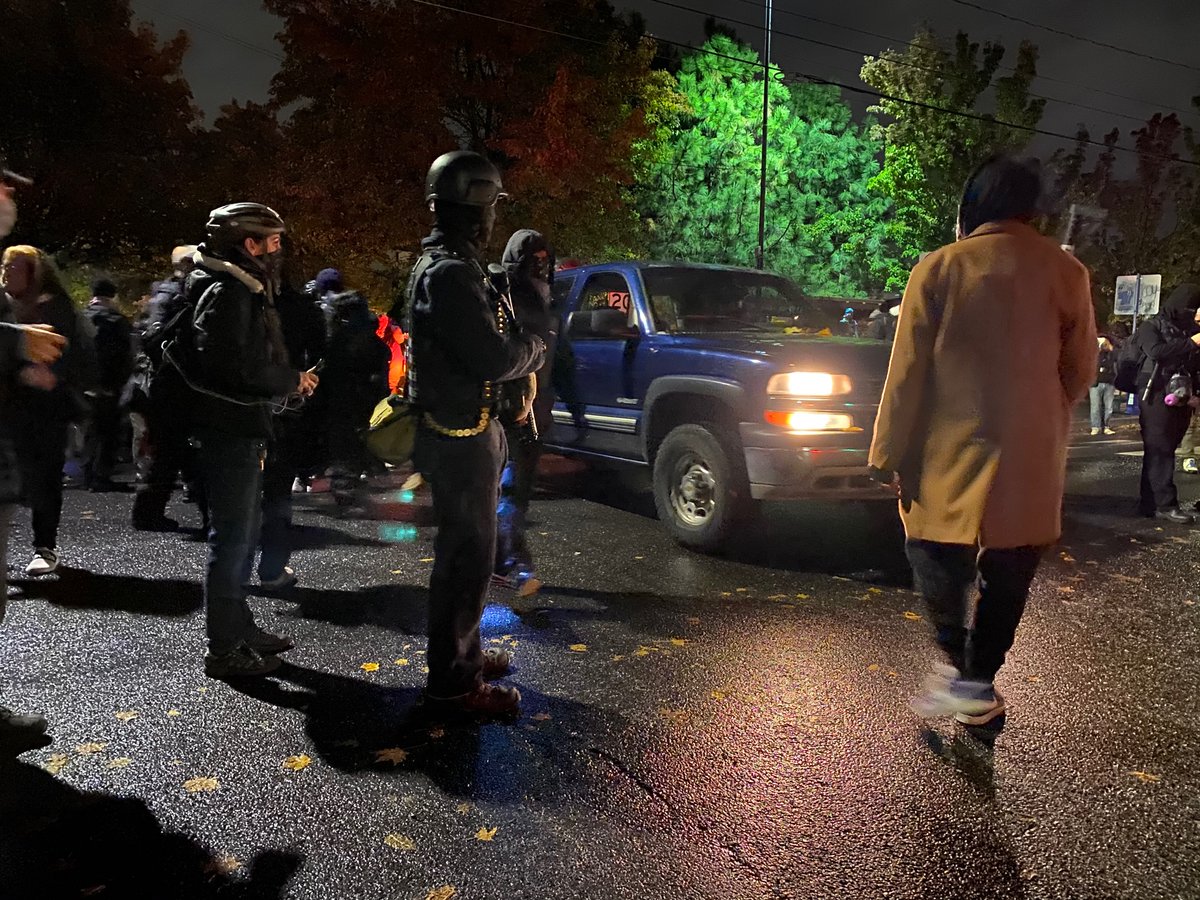 Hundreds of protesters marching in solidarity with Black Lives Matter in Portland, Oregon tonight.  Armed perimeter security walking ahead #portlandprotests #USElections2020