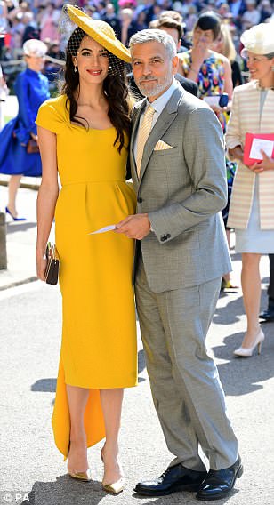 Amal & George Clooney went with a lemon shark (Negaprion brevirostris) motif for the Royal Wedding. They get their name because of the yellowish tint of their skin, which allows them to blend into the surrounding sand. : Getty