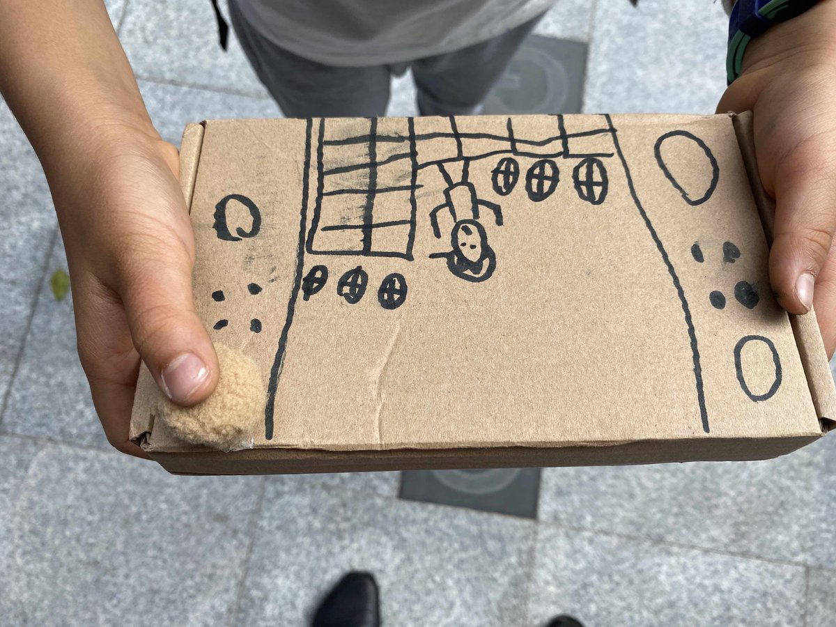 TLopukhin's tweet photo. I love it when students are innovative with cardboard. One group created a lucky draw game, complete with fake money while another student created his own Game Boy!  @AISGZ https://t.co/pTiUOLRzz8