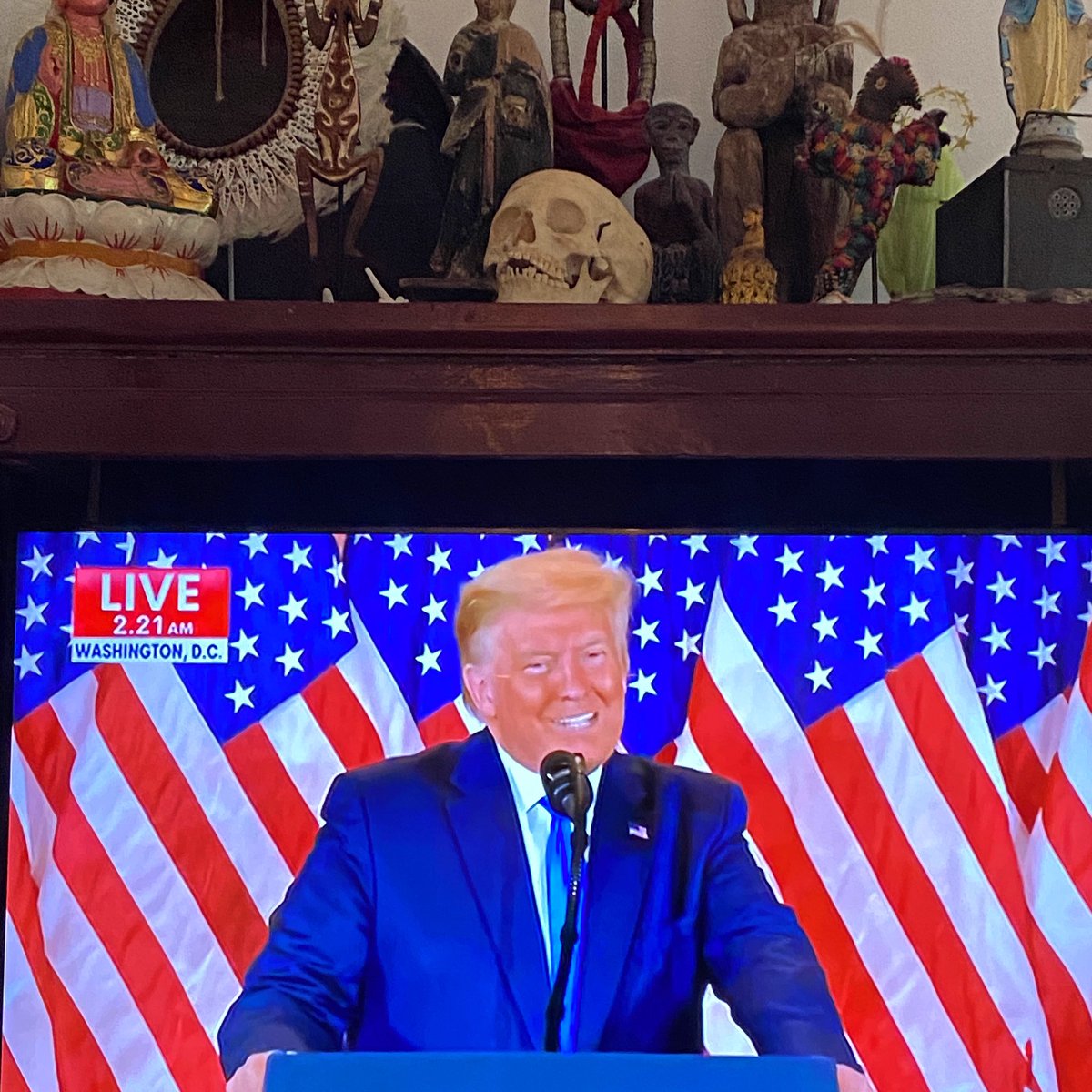 ginafairley's tweet photo. How frightening is this moment ...One might hope that his resemblance to the skull on my TV cupboard is a sign of his defeat ... rather than ours.
#facinghell #thetangerinepresident #realityfilterplease https://t.co/kbi14BKpPh