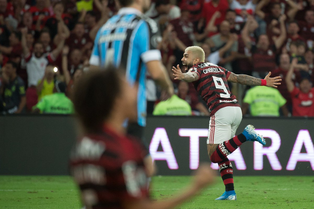 Flamengo's tweet photo. 23/10/19. Nós, rubro-negros, jamais vamos esquecer onde estávamos nessa data.

No Maracanã, o Flamengo goleou o Grêmio por 5 a 0, e se classificou para a final da Libertadores após 38 anos. Gabigol (2), Bruno Henrique, Pablo Marí e Rodrigo Caio marcaram os gols!

#FlaMemória #CRF https://t.co/cesFvPllQN