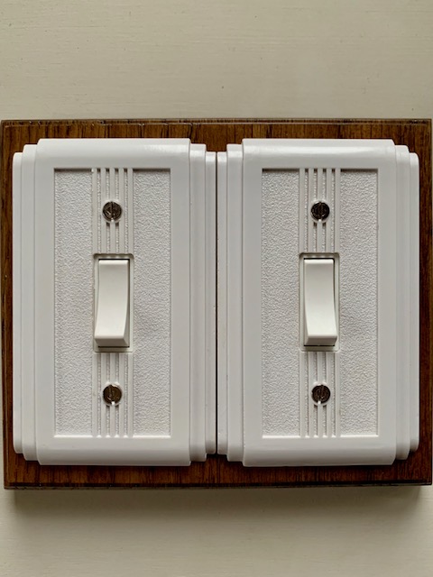 Olivers lighting: Art Deco twin white switch on Medium oak backplate
