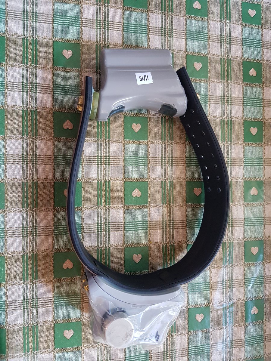 This is just your standard vectronics GPS collar. They have a Vhf to find the dogs also. You remove the magnet to turn it on.Yes that is my dining table