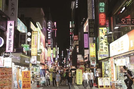 9. Myeongdong [01:51 mark]Maybe one of the most crowded commercial area in Seoul-a major tourist attraction. Lots and lots of cosmetic stores, private currency exchanges, clothing stores and street food vendor